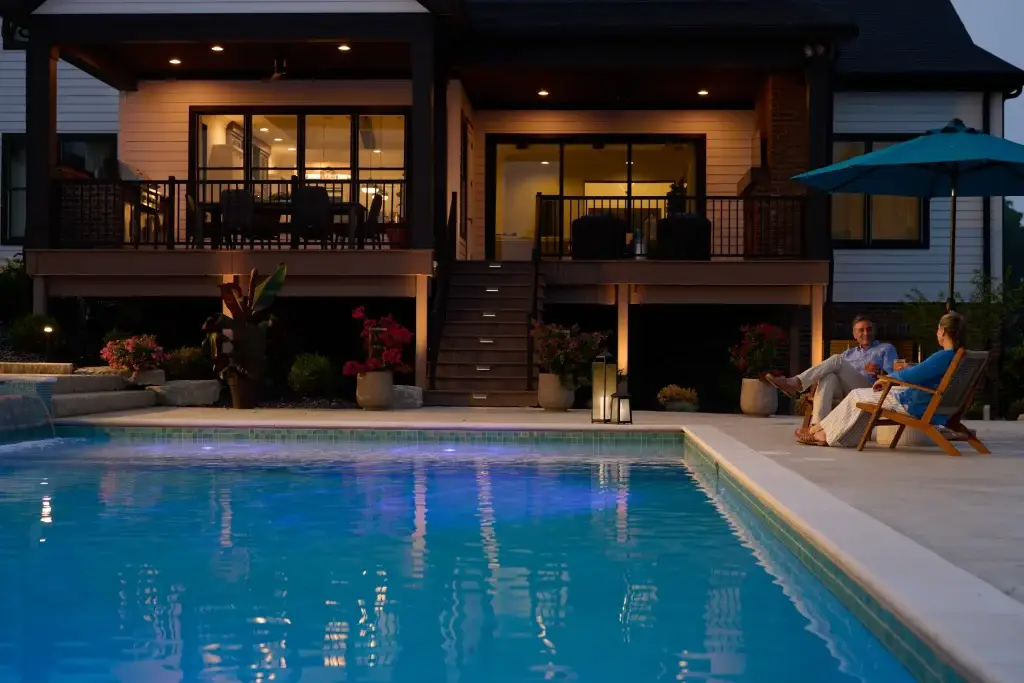 Savant outdoor lighting and pool automation at dusk in a Phoenix-area backyard